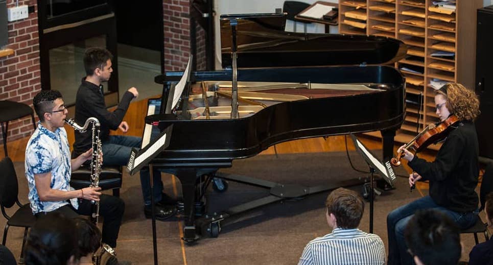 Playing piano at chamber ensemble