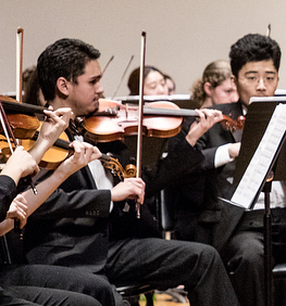 Playing the violin at the Amherst Symphony