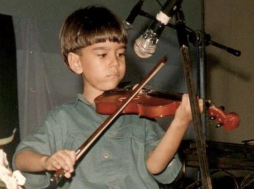 Playing violin as a 5 year old